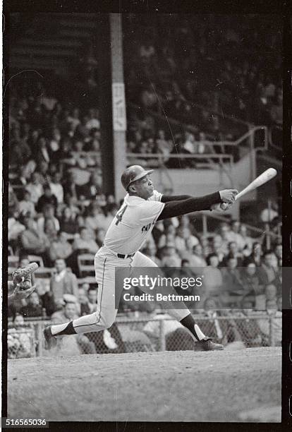 San Francisco Giant's Willie Mays, who just recently broke the National League home run record for a month, blasting 17 in August, goes down swinging...