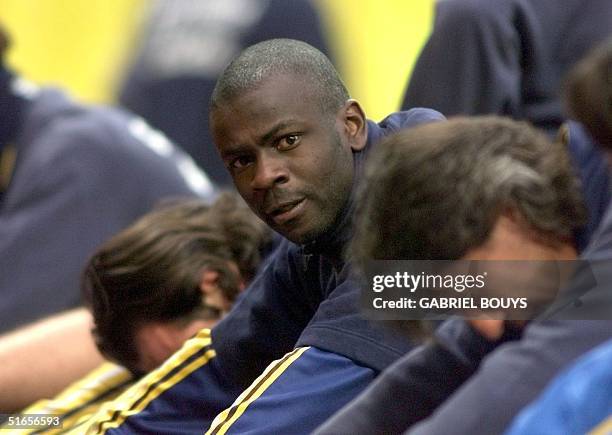 Parma's French defender Lilian Thuram does some stretching exercises 11 May 1999 at Luzhniki Stadium in Moscow during a training session on the eve...
