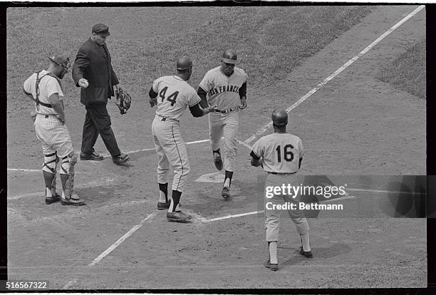 Willie Mays of San Francisco Giants crosses the plate here after hitting three run homer in the 1st inning of game against the Cubs in Wrigley Field....