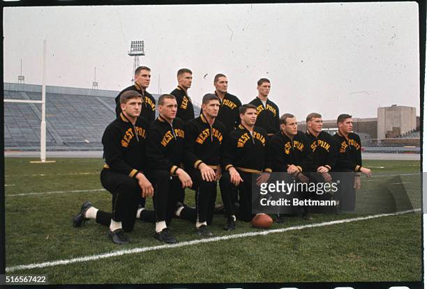 General views of Army's starting offensive team during pre-game warmup prior to November 26th, 1965 Army Navy Classic