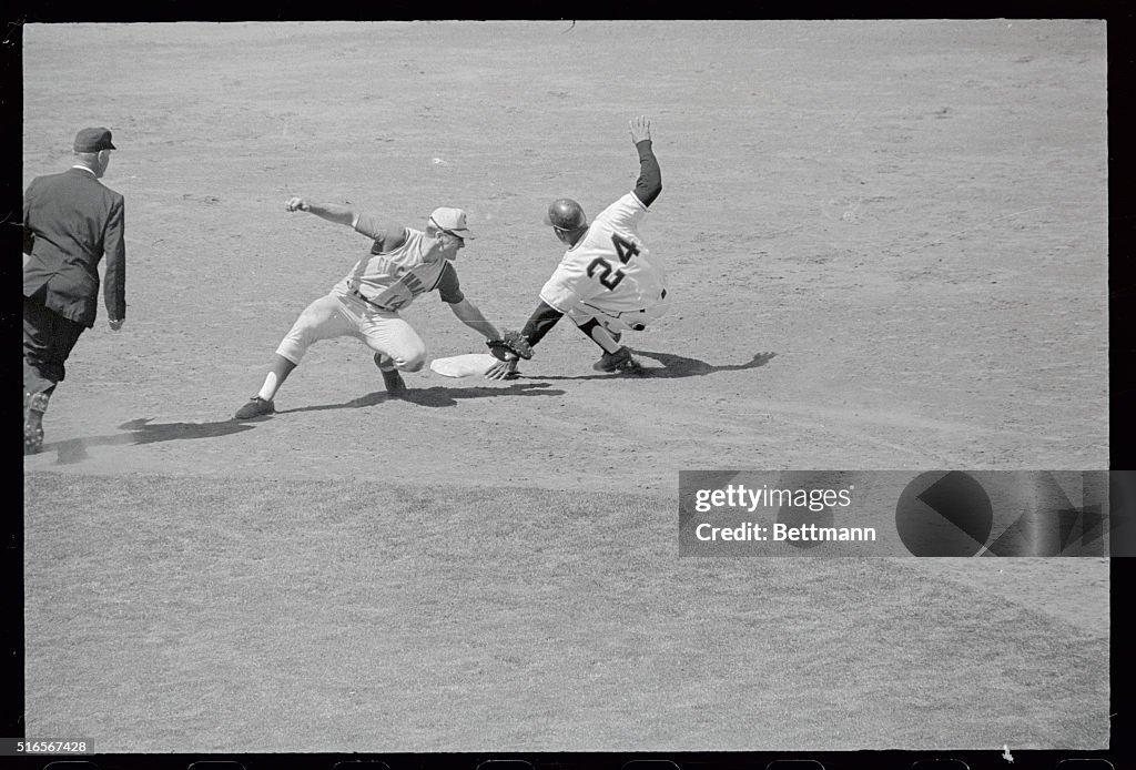 Action Play Between Giants and Reds