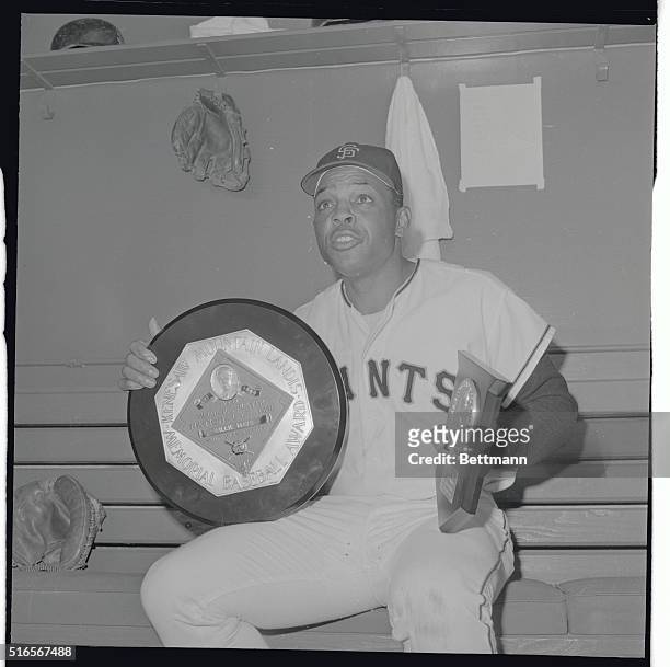 Willie Mays expresses his appreciation here, after receiving two coveted awards from the National League President Warren Giles between games of a...
