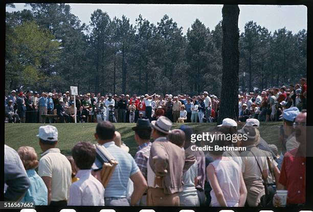 Gary Player and Jack Cupit in Action photos on the 7th green during April 9th third round of Masters golf tournament.