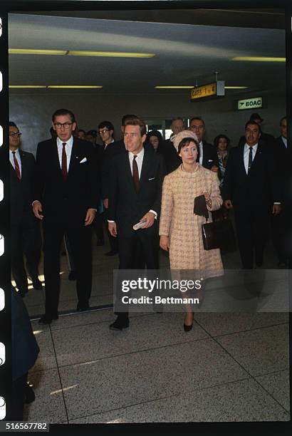 New York...Britain's Princess Margaret and her husband, Lord Snowdon walk through Boac terminal following their arrival here, November 4.