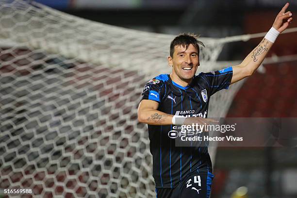 Edgar Benitez of Queretaro celebrates after scoring the first goal of his team during the 11th round match between Queretaro and Chiapas as part of...