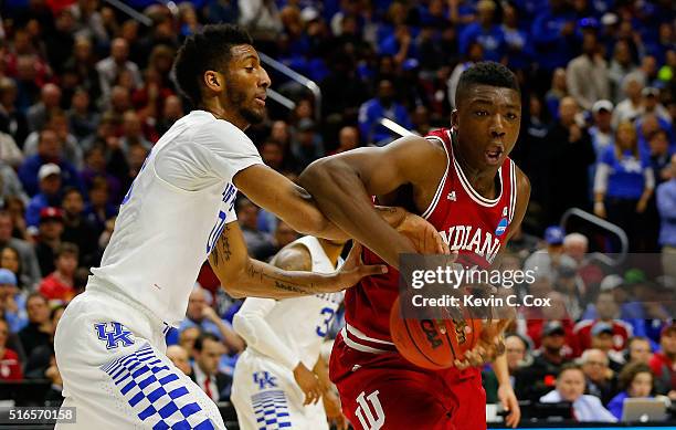 Marcus Lee of the Kentucky Wildcats fouls Thomas Bryant of the Indiana Hoosiers in the second half during the second round of the 2016 NCAA Men's...