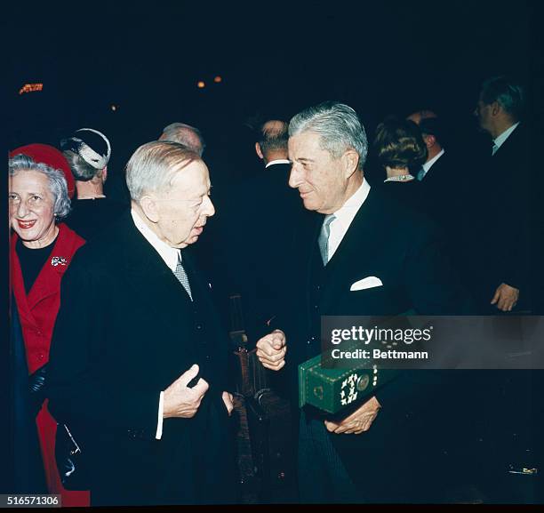 Oslo, Norway: Mr. Henry Labouisse, holding scroll and medal presented to UNICEF, as 1965 winner of Nobel Peace Prize. At right is Gunnar Jahn,...