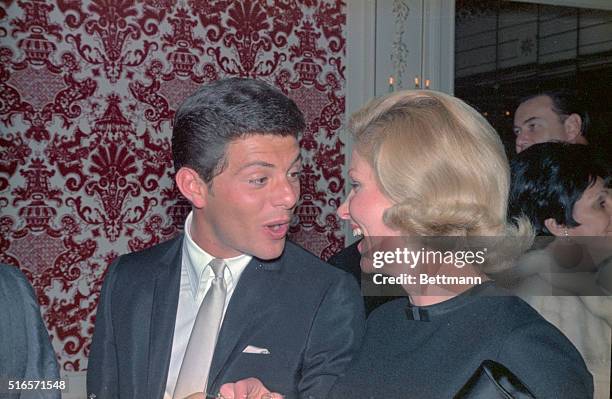 Frankie Avalon and his wife who were among those celebrities attending Paul Anka's opening at the Ambassador's Cocoa Nut Grove.