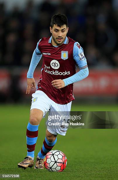 Carles Gil of Aston Villa in action during the Barclays Premier League match between Swansea City and Aston Villa at Liberty Stadium on March 19,...