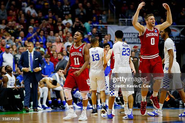 Yogi Ferrell and Max Bielfeldt of the Indiana Hoosiers celebrate defeating Kentucky Wildcats 73 to 67 during the second round of the 2016 NCAA Men's...