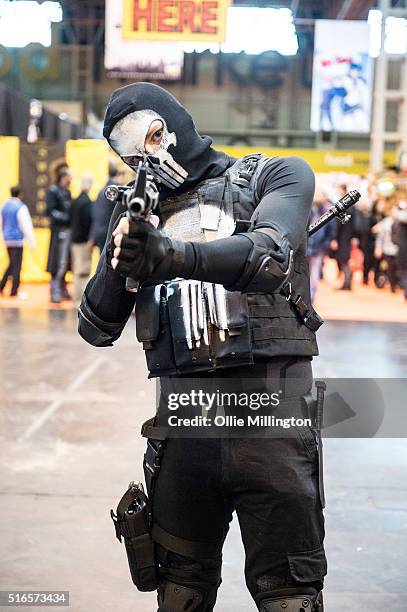 An attendee at Comic Con 2016 in cosplay as his favourite cult character The Punisher on March 19, 2016 in Birmingham, United Kingdom.