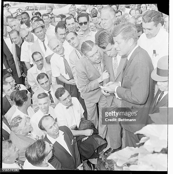 Robert F. Kennedy bids his son, Christopher, farewell, at nearby Dulles International Airport today, Kennedy left on the first leg of his four nation...
