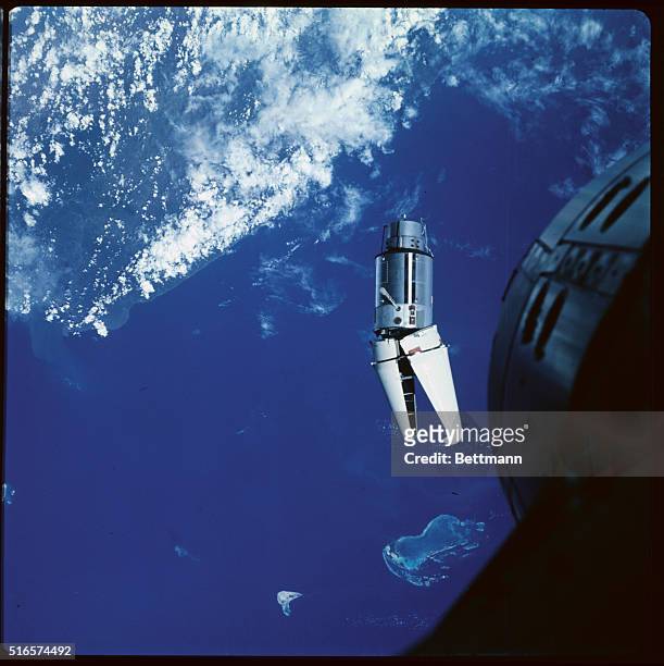 This color photo, taken by Gemini 9 astronauts, shows the augmented target docking adapter , dubbed by Command Pilot Tom Stafford as "The Angry...