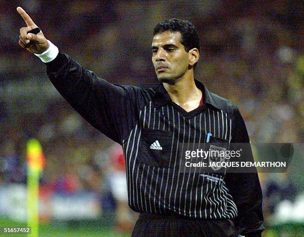 Egyptian referee Gamal Ghandour gestures during the1998 Soccer World Cup quarter final match between Denmark and Brazil, 03 July at the Stade de la...