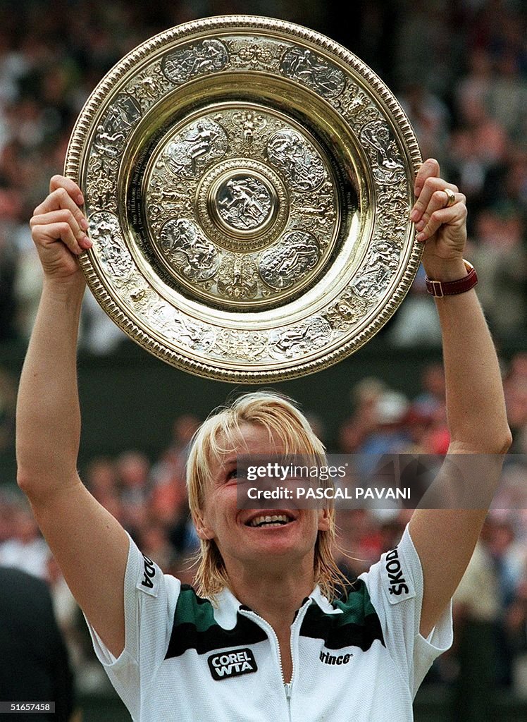 Czech Republic's Jana Novotna looks up at the ladi