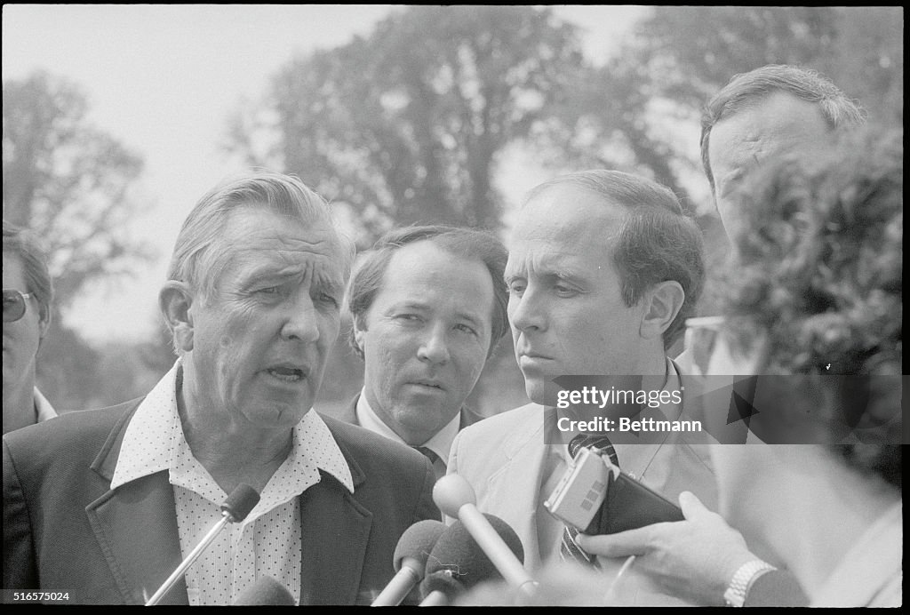 Donald Regan and Others Conversing with Press
