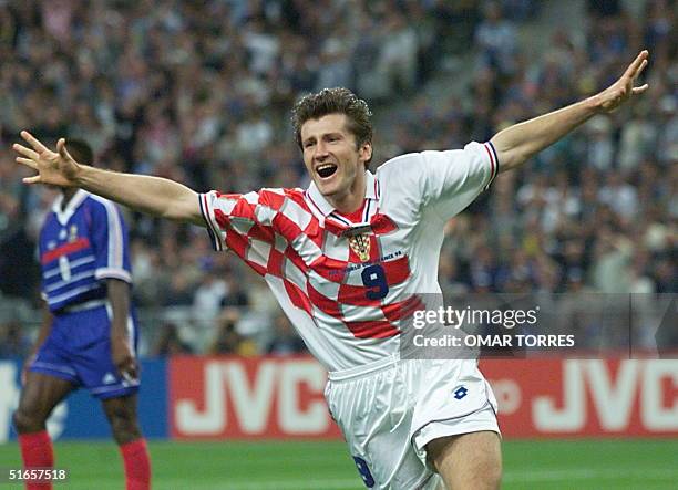 Croatian forward Davor Suker jubilates after scoring a goal for his team, 08 July during the Soccer World Cup semi-final match France vs Croatia at...