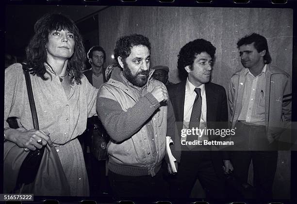 Abbie Hoffman, the 1969 Yippie leader who spent six years on the run, arrives with his wife, Johanna, at Criminal court for sentencing. He faces up...