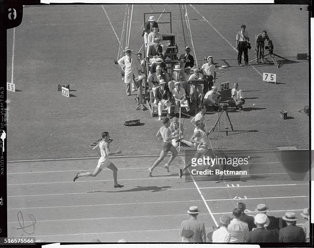 This is the third heat during the 400 meter race, trial II, with B. Eastman of U.S.A., winner; Renner of Austria, 2nd; Strandvall of Finland, 3rd;...