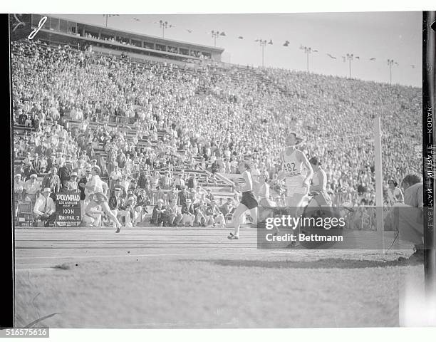 Stella Walsh, the Cleveland, Ohio girl competing for Poland, set a world record for women in running the 100 meter event in her first round...