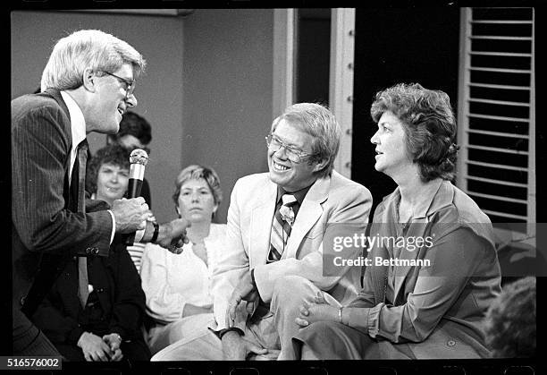 Chicago, IL- Billy Carter and his wife are shown on the "Phil Donahue Show" discussing the US Senates investigation of Billy's Lybian affairs.