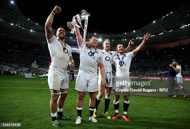 James Haskell, Dylan Hartley, Mike Brown and Danny Care of England celebrate with the trophy following their 31-21 victory during the RBS Six Nations...