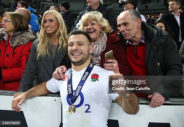 Danny Care of England celebrates winning the Grand Slam with his girlfriend Jodie and family following the RBS Six Nations match between France and...