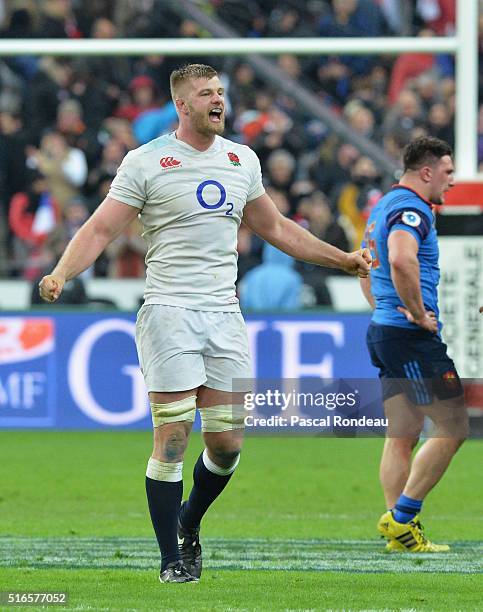 George Kruis of England celebrates winning the Grand Slam during the RBS Six Nations match between France and England at Stade de France on March 19,...