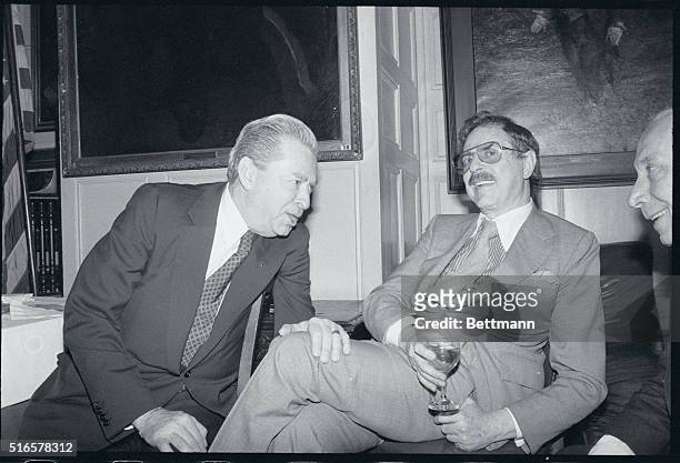 New York, New York: Producer Alexander Cohen puts his hand on the knee of producer David Merrick during a reconciliation scene here, May 20, at the...