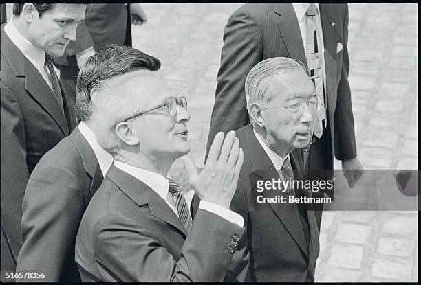 Tokyo, Japan: Erich Honecker , chairman of the Council of State of East Germany, is escorted by Japan's Emperor Hirohito to take part in welcoming...