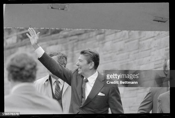 Washington: President Ronald Reagan waves as he leaves the Washington Hilton seconds before he was shot by an unidentified assailant. Reagan was...