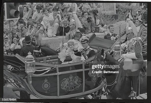 Charles and his bride, Lady Diana, in coach pass through the Strand approaching Trafalgar Square, after their wedding at St. Paul's Cathedral