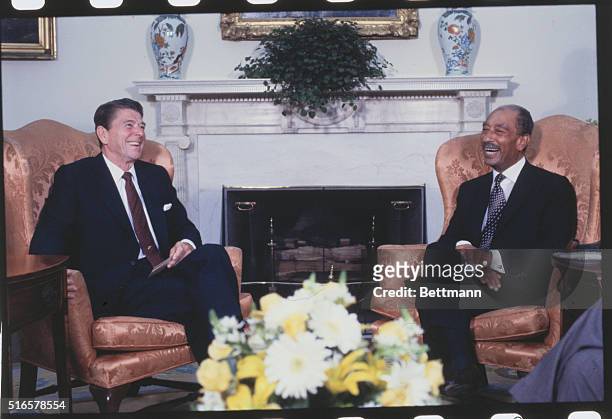 Washington: U.S. President Ronald Reagan and Egyptian President Anwar Sadat meet for the first time in the Oval Office.