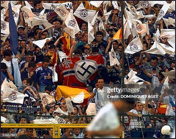 Group of soccer supporters hold a nazi flag during the match Real Madrid against Atletico Madrid at the Bernabeu stadium in Madrid 14 June. Real won...