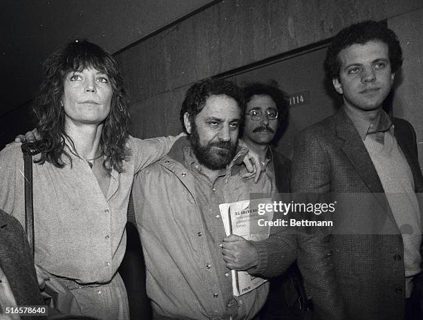 Abbie Hoffman, the 1969 Yippie leader who spent six years on the run, arrives at Criminal court, with his wife Johanna, for sentencing. He faces up...