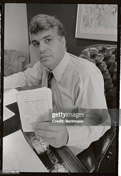 Richard Phillips, a Philadelphia attorney holds up a handful of telephone messages that his office has been taking all day 6/1 after he told...