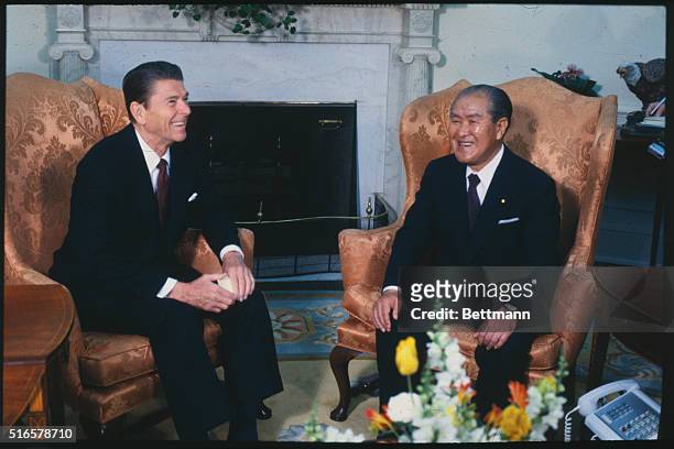 President Ronald Reagan chats with Japanese Prime Minister Zenko Suzuki.