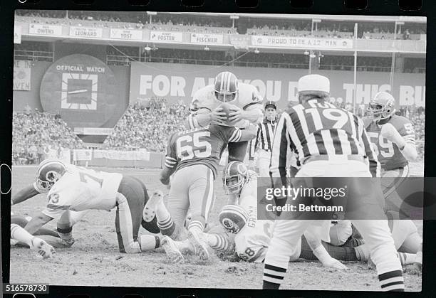 Washington. Redskins John Riggins dives over the goal line in the third quarter 1/8 as 49ers Lawrence Pillers tries the stop as Redskins blockers...