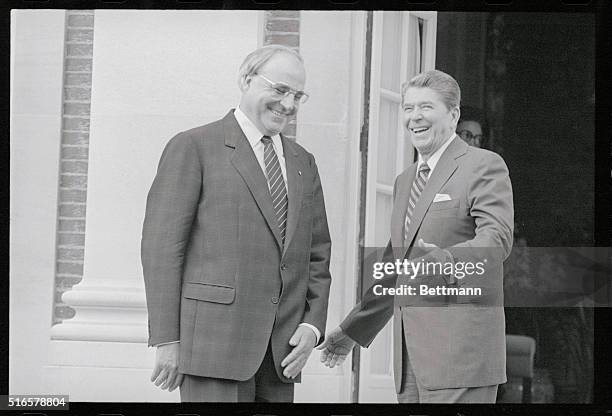 London, England: President Ronald Reagan with German chancellor Dr. Helmut Kohl at Winfield House, London where they had talks prior to the economic...