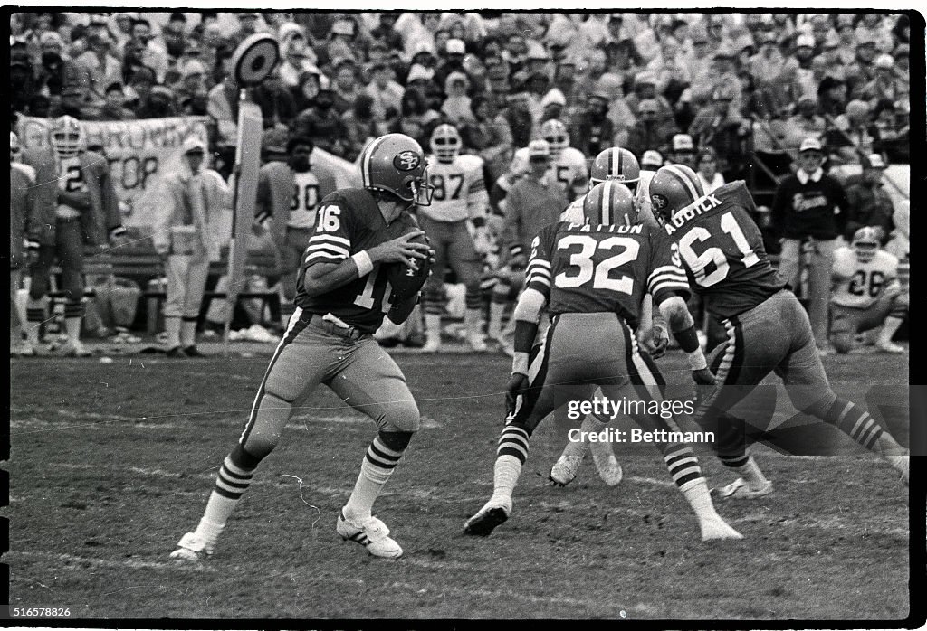 Joe Montana About to Pass Football in Game