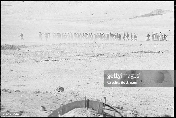 Beirut: Lebanese Forces soldiers carrying personal weapons jump from the ship Jeanne D'Arc as it arrives early 2/23, in a Christian-held port in east...