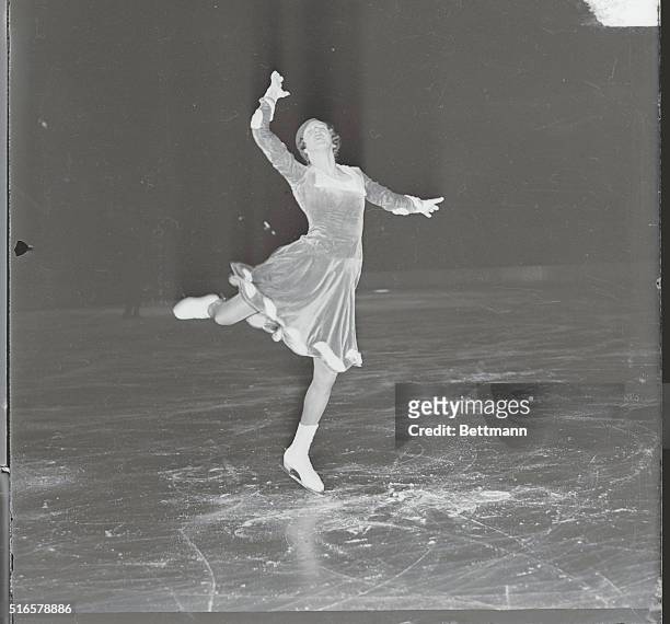 Again Winner of Figure Skating Championship. Mrs. Constance Wilson Samuel, of Toronto, Canada., cutting a graceful figure on the ice of Madison...