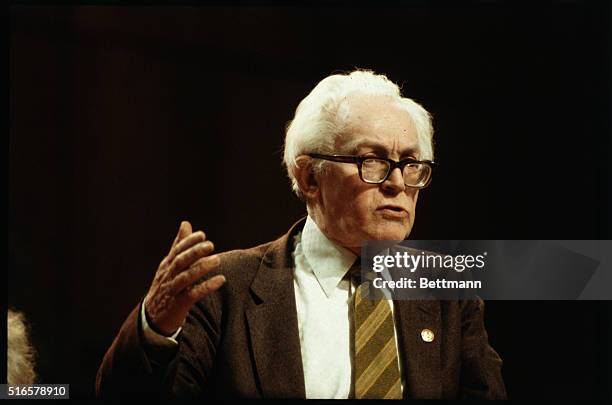 Close-up of Michael Foot, leader of the British Labour Party. He gestures as he speaks.