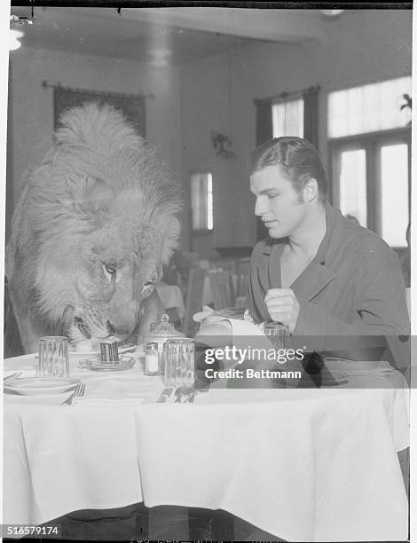 What! No Lion-Aise Potatoes. "Jackie", a very well-mannered lion, has a weakness for ice cream, so when he and Buster Crabbe were finished with a...