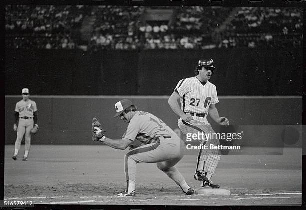 Expos Pete Rose keeps Phillies' Glenn Wilson close to first base on a pickoff attempt in the sixth inning, July 27th. Rose tied and broke Ty Cobb's...