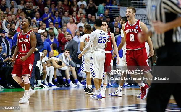 Indiana's Yogi Ferrell and Max Bielfeldt celebrate as the clock runs out in a 73-67 win against Kentucky in the second round of the NCAA Tournament...