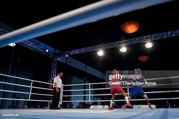 Virginia Fuchs of USA fights against Grazieli Jesus de Sousa of Brazil during the Women's Fly category as part of American Olympic Qualification...