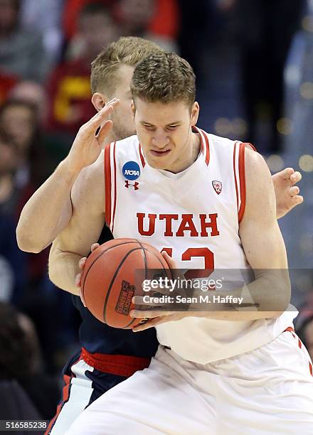 Jakob Poeltl of the Utah Utes drives the ball against Domantas Sabonis of the Gonzaga Bulldogs during the second round of the 2016 NCAA Men's...
