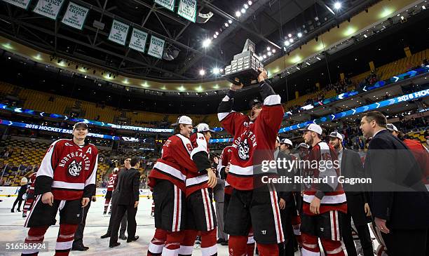 Trevor Owens of the Northeastern Huskies celebrates as the Northeastern Huskies win the Hockey East Championship during NCAA hockey in the Hockey...