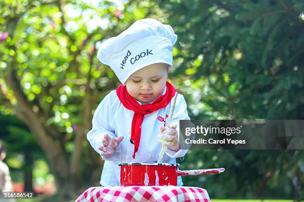 little chef - adult imitation stock pictures, royalty-free photos & images